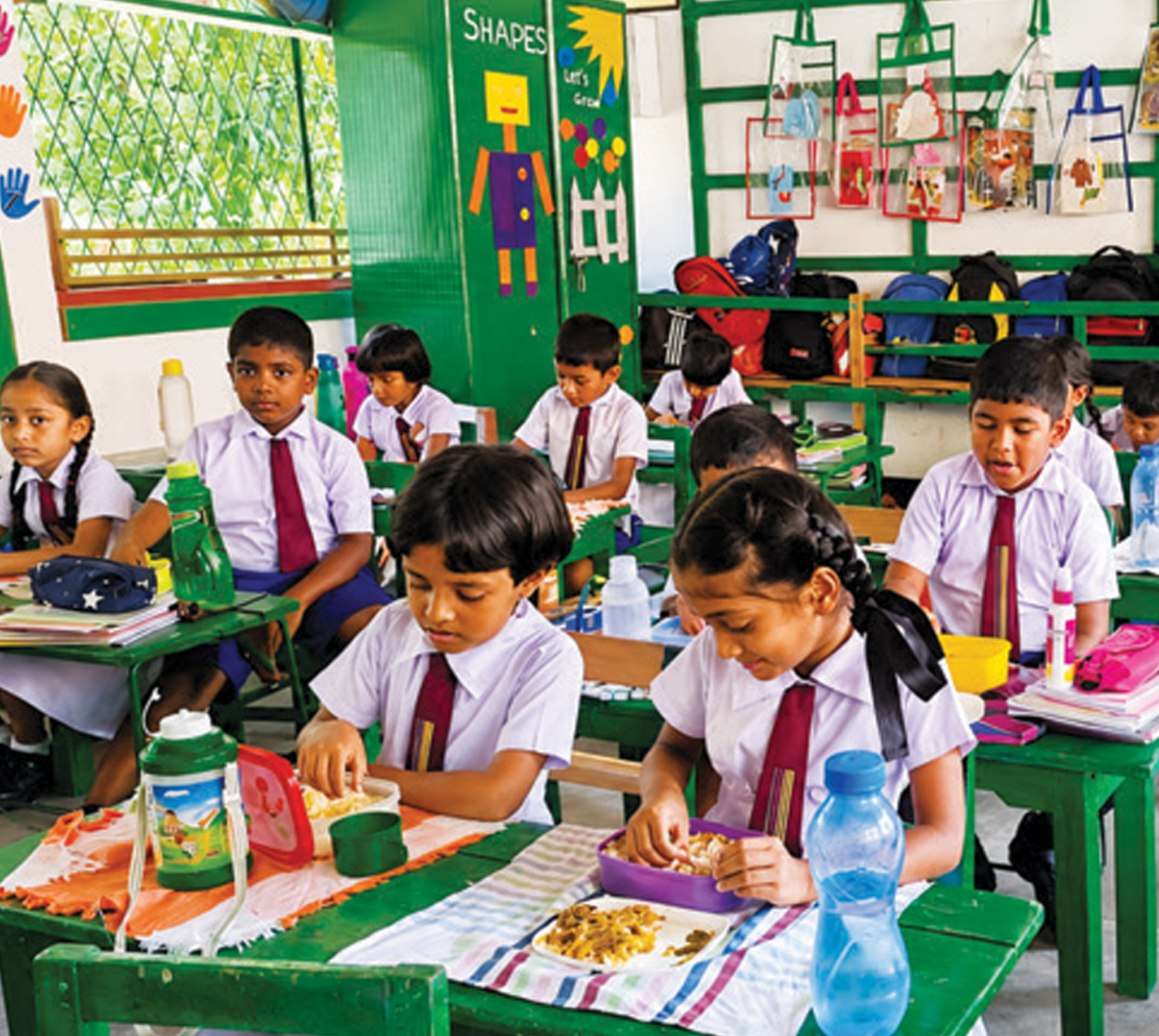Schoolchildren receiving a mid-day meal